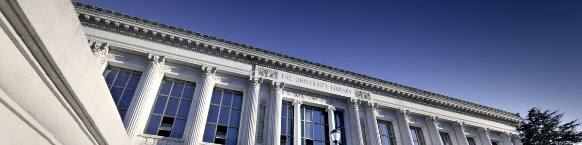 Decorative image of the sunset light illuminating the Doe Library